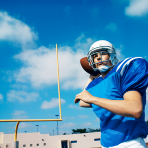 quarterback in blue jersey throwing football after healthy nutrition