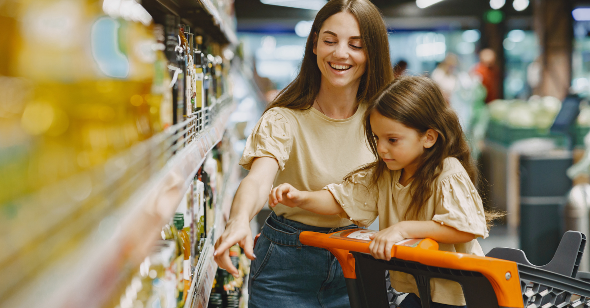 mother and daughter grocery shopping