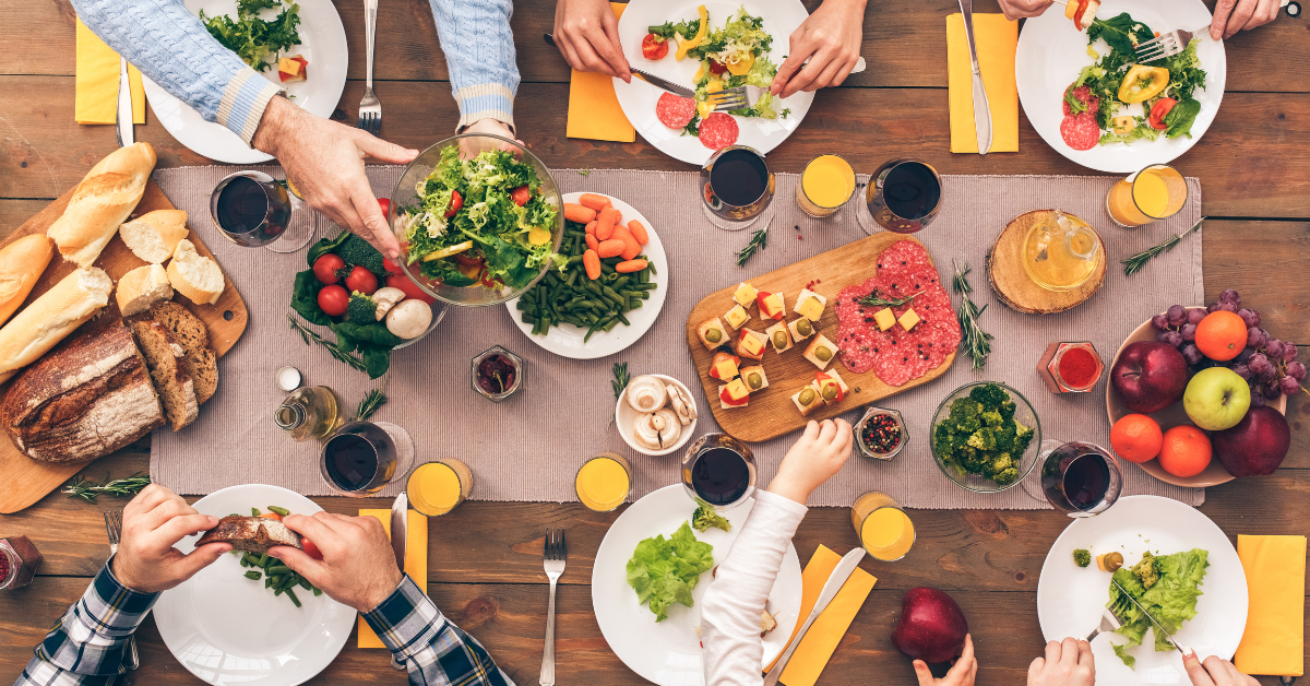 friends eating whole foods dinner friends eating whole foods dinner