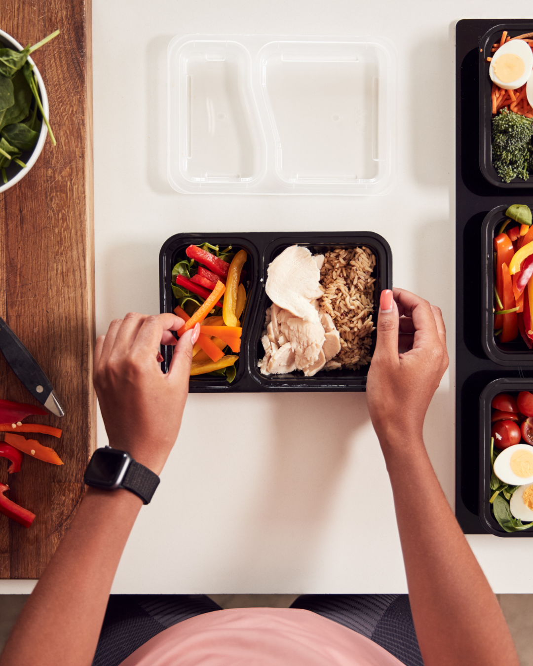 balanced meal prep session person preparing a balanced meal with healthy portion control to support weight management and hormone regulation