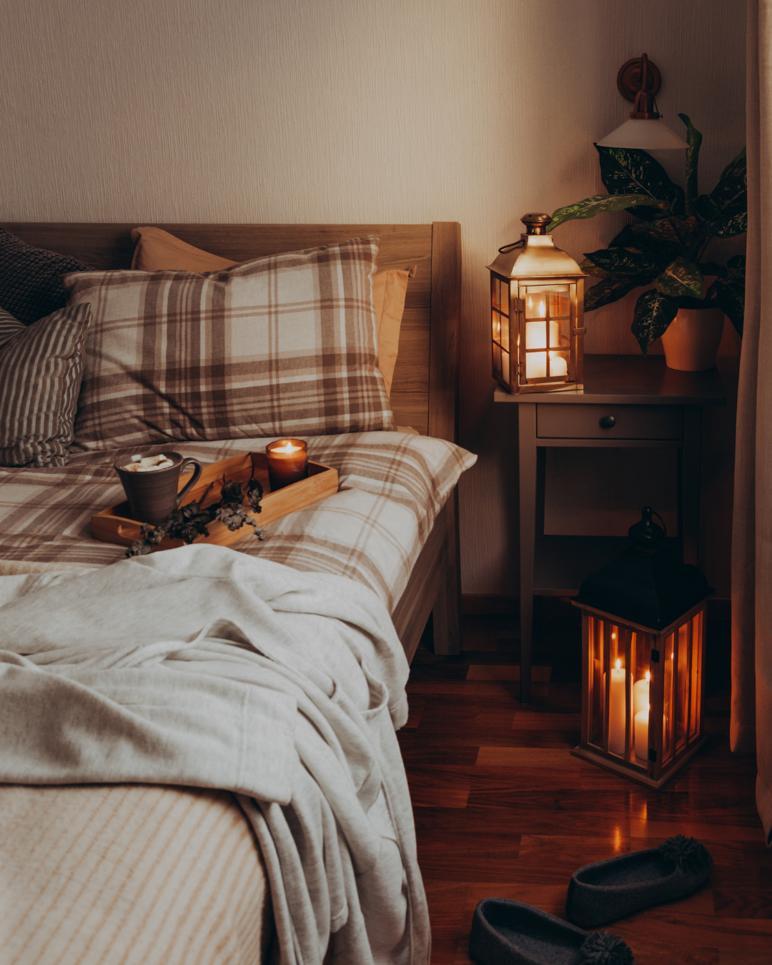 cozy bedroom with dark cool quiet environment cozy, dimly lit bedroom with a person winding down for a good night’s sleep