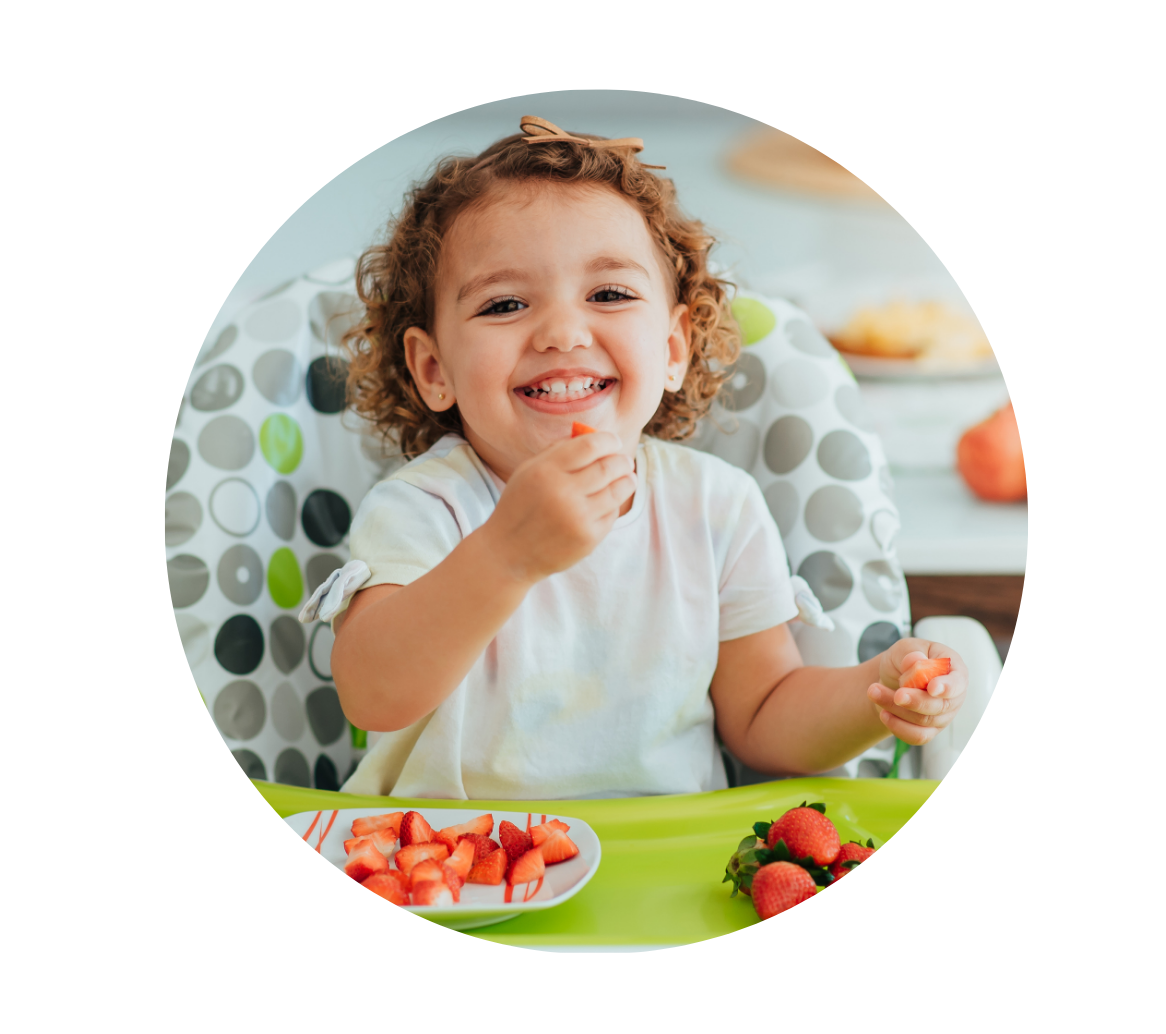 little girl eating healthy after pediatric nutrition appointment