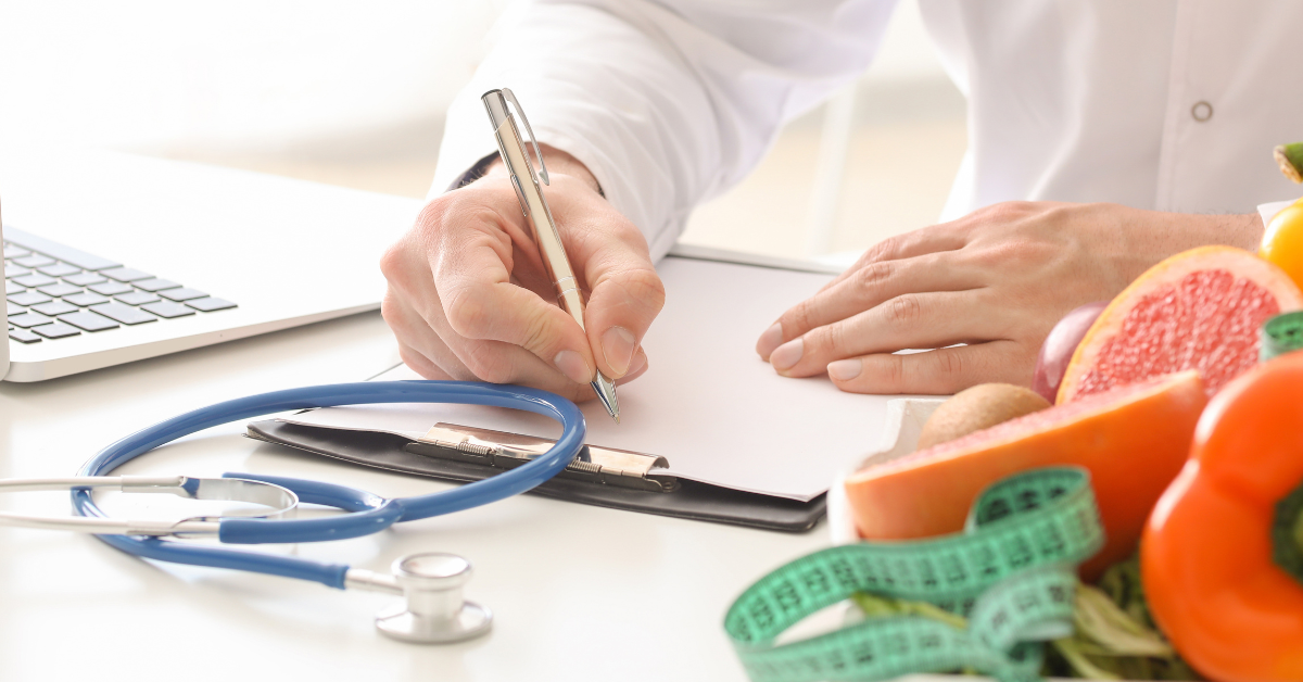 registered-dietician-writing-clinical-notes